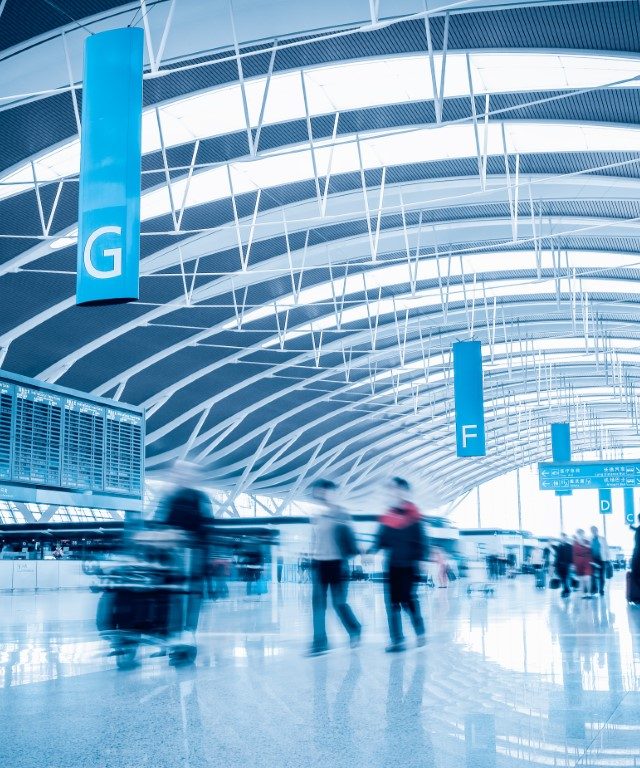 modern airport terminal  with passengers motion blur in shanghai